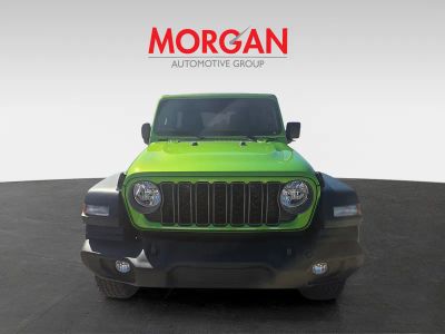 2026 Jeep Wrangler — rear three-quarter view