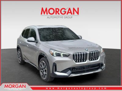 2026 BMW X1 xDrive28i in Space Silver Metallic — front three-quarter view