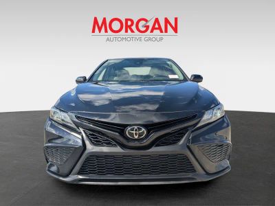 2021 Toyota Camry — rear three-quarter view