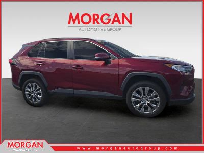 2019 Toyota RAV4 XLE Premium in Red — front three-quarter view