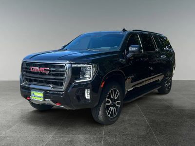 2024 GMC Yukon XL — rear three-quarter view