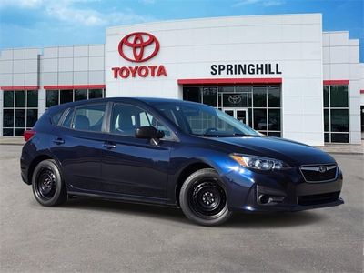 2019 Subaru Impreza 2.0i — front three-quarter view