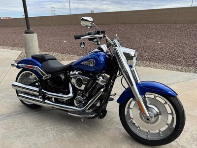 2025 Harley-Davidson FLFB - Fat Boy in BLUE BURST — front three-quarter view