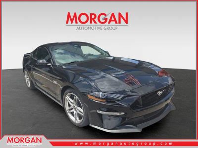 2021 Ford Mustang GT Premium in Shadow Black — front three-quarter view