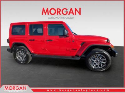 2026 Jeep Wrangler Sahara in Red — front three-quarter view