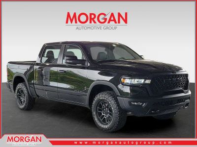 2026 Ram 1500 Rebel in Diamond Black Crystal Pearlcoat — front three-quarter view