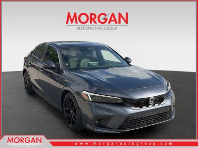 2022 Honda Civic Hatchback Sport Touring in Black — front three-quarter view