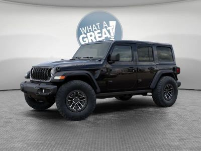 2026 Jeep Wrangler — rear three-quarter view