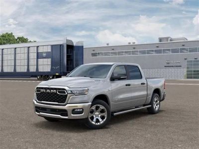 2026 RAM Ram 1500 RAM 1500 BIG HORN CREW CAB 4X4 5'7' BOX in Silver Zynith Exterior Paint — front three-quarter view