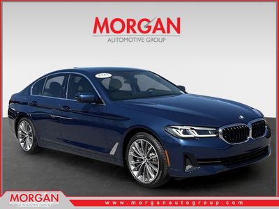 2022 BMW 5 Series 540i in Blue — front three-quarter view