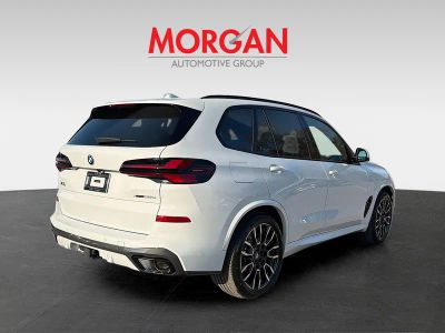 2026 BMW X5 — rear three-quarter view