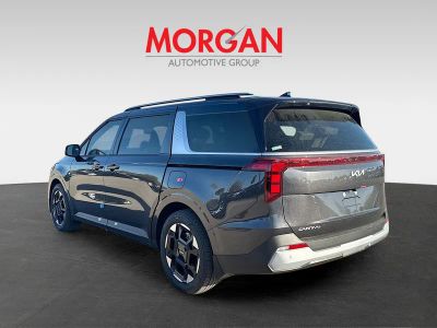 2026 Kia Carnival — rear three-quarter view