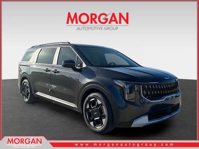 2026 Kia Carnival EX in Panthera Metal — front three-quarter view