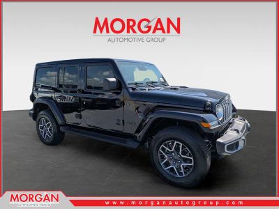 2026 Jeep Wrangler Sahara in Black — front three-quarter view