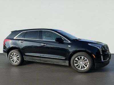 2018 Cadillac XT5 Luxury in Stellar Black Metallic — front three-quarter view