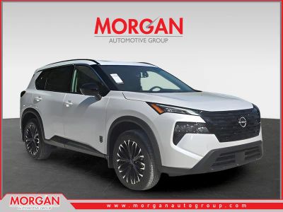 2026 Nissan Rogue Dark Armor in White — front three-quarter view