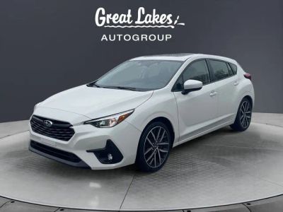 2024 Subaru Impreza Sport in Crystal White Pearl — front three-quarter view