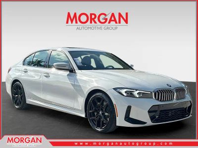 2026 BMW 3 Series 330i in Alpine White — front three-quarter view