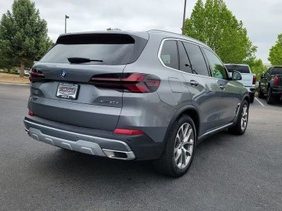 2026 BMW X5 — rear three-quarter view