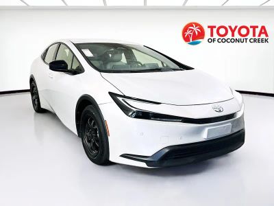 2023 Toyota Prius LE in Pearl — front three-quarter view