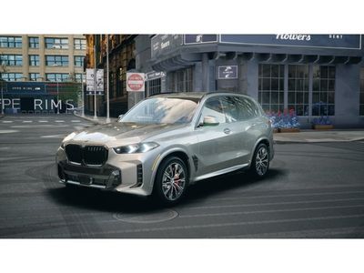 2026 BMW X5 xDrive40i xDrive40i in Skyscraper Grey Metallic — front three-quarter view