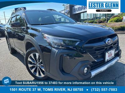 2023 Subaru Outback Limited XT in Crystal Black Silica — front three-quarter view