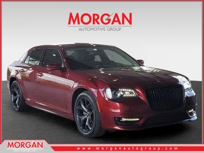 2023 Chrysler 300 Touring L in Velvet Red Pearlcoat — front three-quarter view