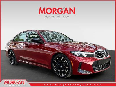 2025 BMW 3 Series M340i in Vegas Red Metallic — front three-quarter view