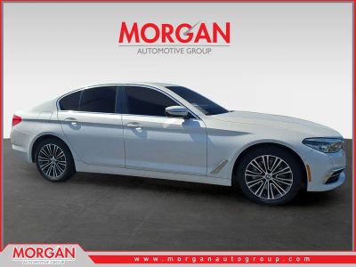 2020 BMW 5 Series 530i in White — front three-quarter view