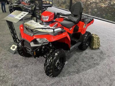 2026 Polaris® Sportsman Touring 570 Indy Red — front three-quarter view