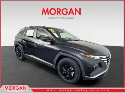 2022 Hyundai Tucson SEL in Portofino Gray — front three-quarter view
