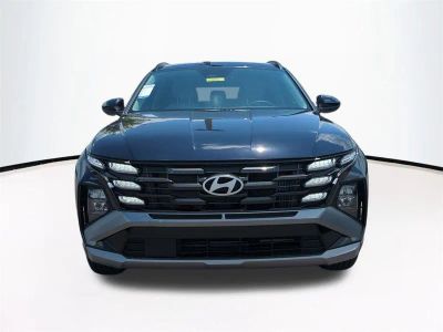 2026 Hyundai TUCSON HYBRID — rear three-quarter view