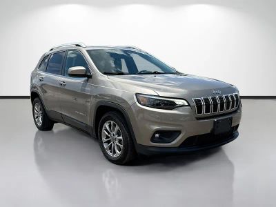 2019 Jeep Cherokee Latitude Plus in Beige — front three-quarter view