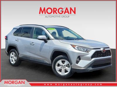 2021 Toyota RAV4 XLE in Silver Sky Metallic — front three-quarter view