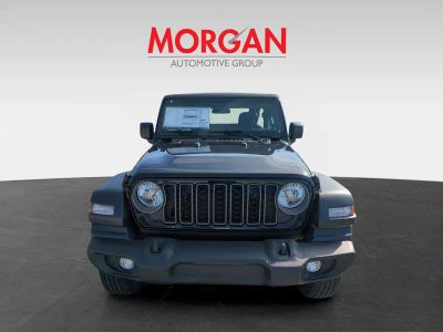 2026 Jeep Wrangler — rear three-quarter view