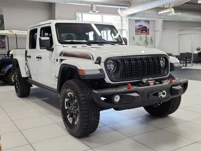 2026 Jeep Gladiator GLADIATOR SHADOW OPS 4X4 in Bright White Clear-Coat Exterior Paint — front three-quarter view