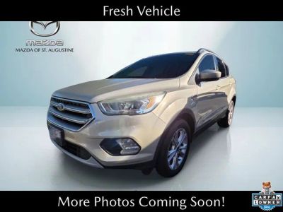 2017 Ford Escape SE in Gold — front three-quarter view