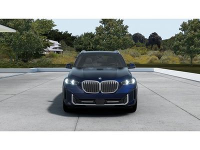 2026 BMW X5 — rear three-quarter view