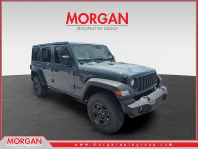 2026 Jeep Wrangler Sport in Gray — front three-quarter view