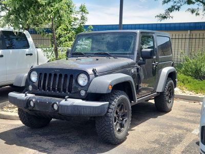 2017 Jeep Wrangler — rear three-quarter view