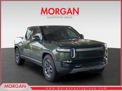 2023 Rivian R1T Adventure in Green — front three-quarter view
