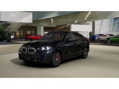 2027 BMW X6 xDrive40i in Carbon Black Metallic — front three-quarter view