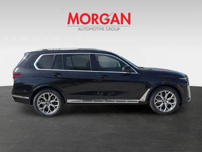 2024 BMW X7 — rear three-quarter view