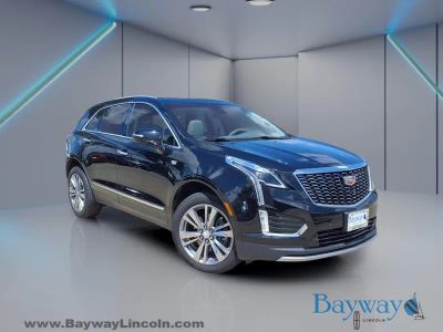 2025 Cadillac XT5 Premium Luxury in Stellar Black Metallic — front three-quarter view