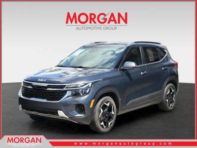 2024 Kia Seltos EX in Gravity Gray — front three-quarter view