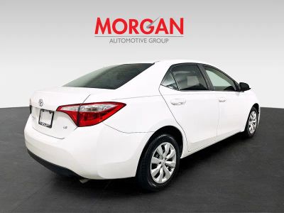 2016 Toyota Corolla — rear three-quarter view