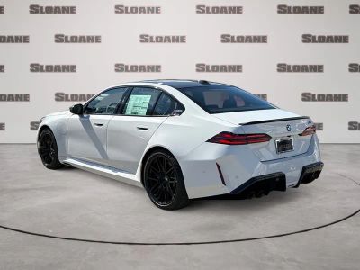 2026 BMW M5 — rear three-quarter view