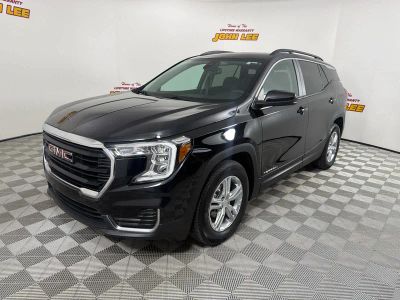 2023 GMC Terrain SLE in Ebony Twilight Metallic — front three-quarter view