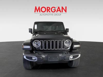 2025 Jeep Wrangler — rear three-quarter view