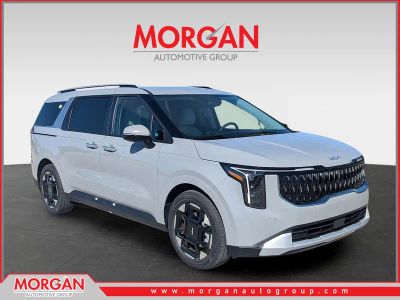 2026 Kia Carnival EX in Ceramic Silver — front three-quarter view